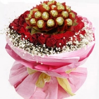 Red roses with ferrero